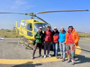 Group preparing for a scenic adventure with Taktok Brothers Heli Tours