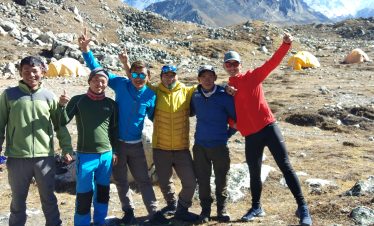 Trekking group enjoying a break during the Upper Dolpo Trek in Nepal.