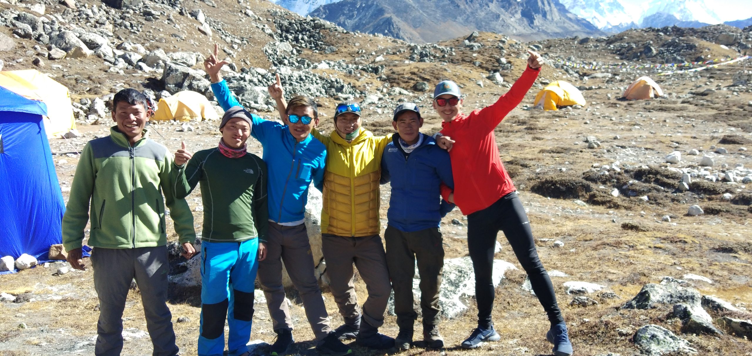 Trekking group enjoying a break during the Upper Dolpo Trek in Nepal.